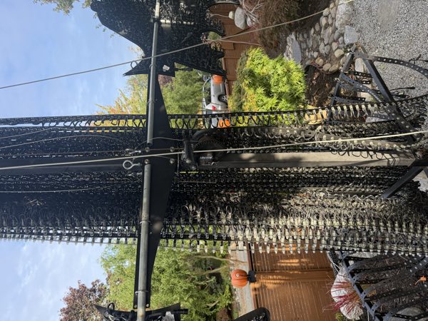 The mega tree pole with pixel strands bundled around it during setup