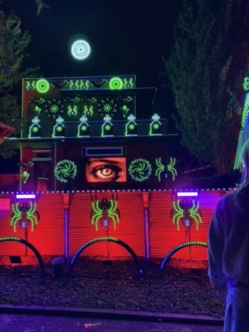 Halloween display in red with a giant eye and spiders